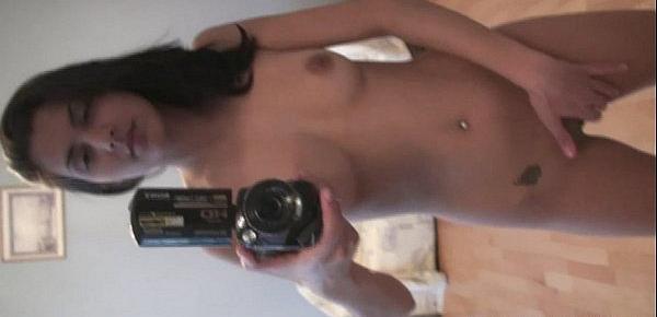  Stunning girl records herself while being nude